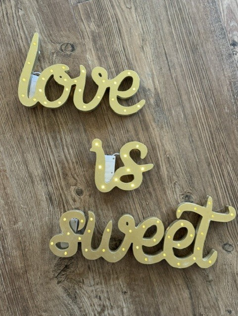"LOVE IS SWEET" light up sign