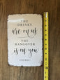 "The Drinks are on us " sign
