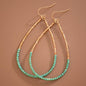 Gold Beaded Hollow Drop Earrings with Glass Beads